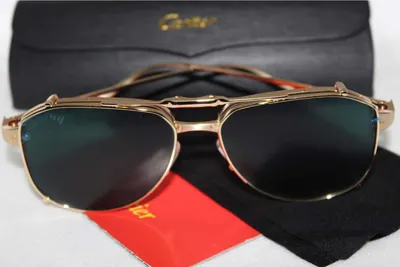 Lentes de sol Cartier de aviador dorados con micas verdes