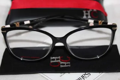Armazón oftálmico Carolina Herrera negro de ojo de gato con patillas de rayas