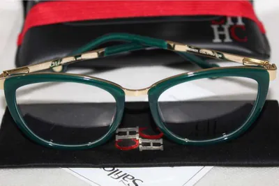 Armazón oftálmico Carolina Herrera verde con dorado