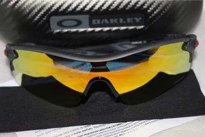 Lentes deportivos Oakley con mica naranja espejeada