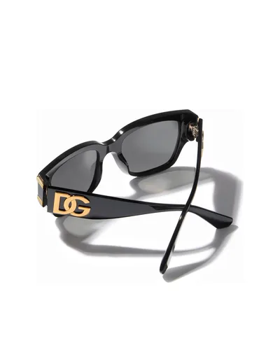 Lentes de sol Dolce & Gabbana negros con el logo DG dorado en la patilla