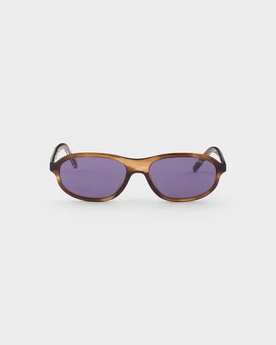 Lentes de sol Prada de carey ámbar con micas violetas