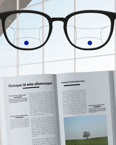 Lentes progresivos: la zona de abajo enfoca un libro abierto